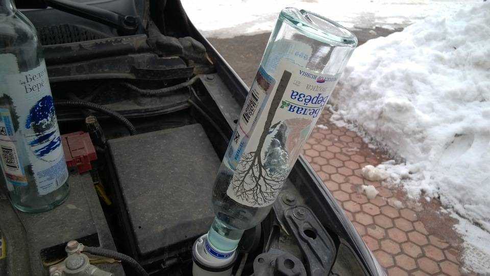 Лед в бачке омывателя автомобиля. как растопить? в том числе метод с использованием водки